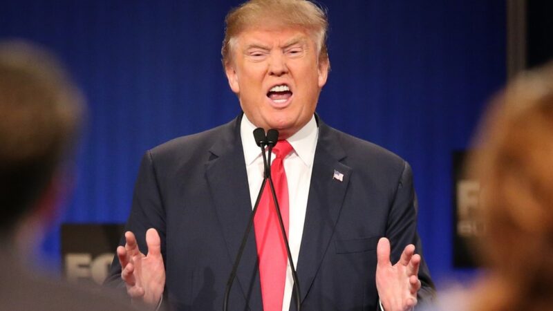 Afbeelding met persoon, Menselijk gezicht, kleding, pak Door AI gegenereerde inhoud is mogelijk onjuist.