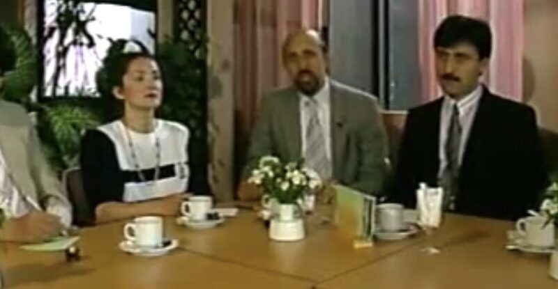 Afbeelding met persoon, pak, person, kleding Door AI gegenereerde inhoud is mogelijk onjuist.